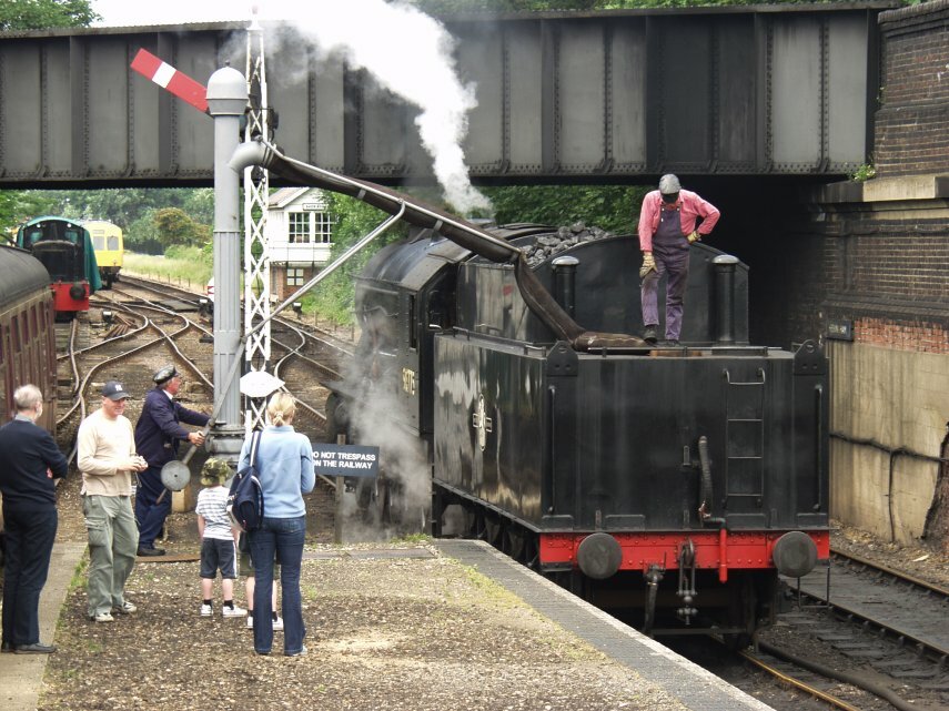 A Locomotive taking on Water, Sheringham, Norfolk, England, Great Britain