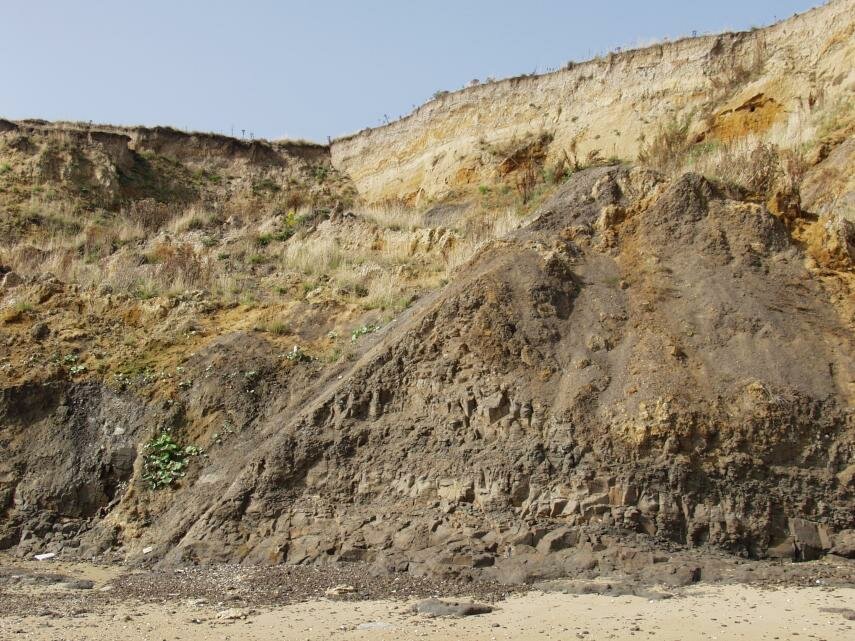 Photograph of the London Clay, showing stratification, under the Red Crag, Walton-on-the-Naze, Essex, England
