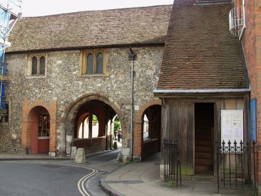 Scene showing the church of St. Swithun, Winchester, Hampshire, England