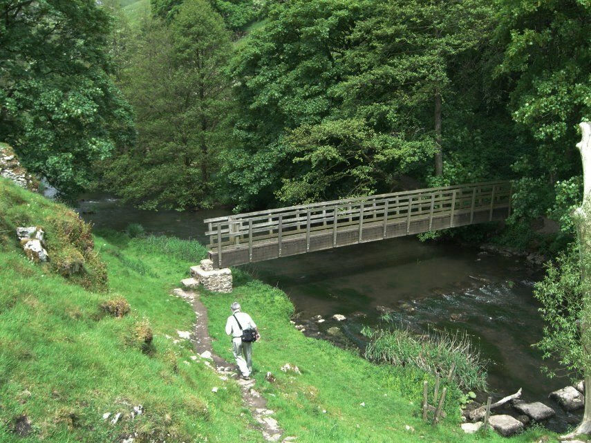 Scene showing Gipsy Bank Bridge, Wolfscote Dale, Hartington, Peak District, Derbyshire, England